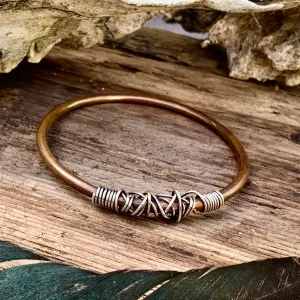 Copper and sterling silver bangle.