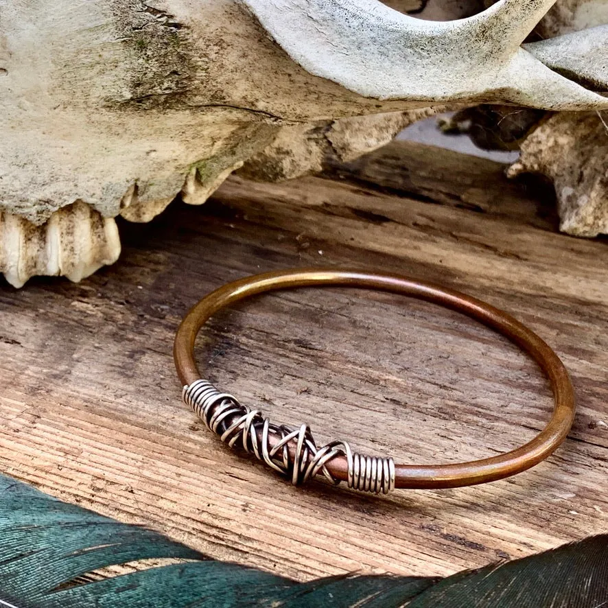 Copper and sterling silver bangle.